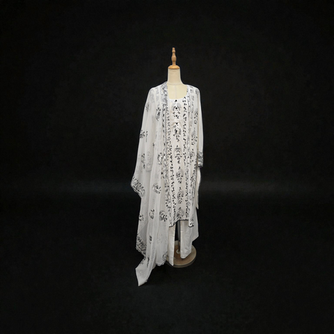 A graceful and timeless ensemble in soft white